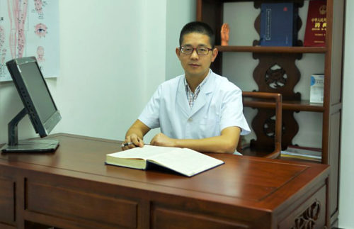 Dr Huang Shile